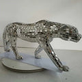 Luxury leopard figurine in stunning mirror mosaic finish, an extravagant statement piece for refined interiors.