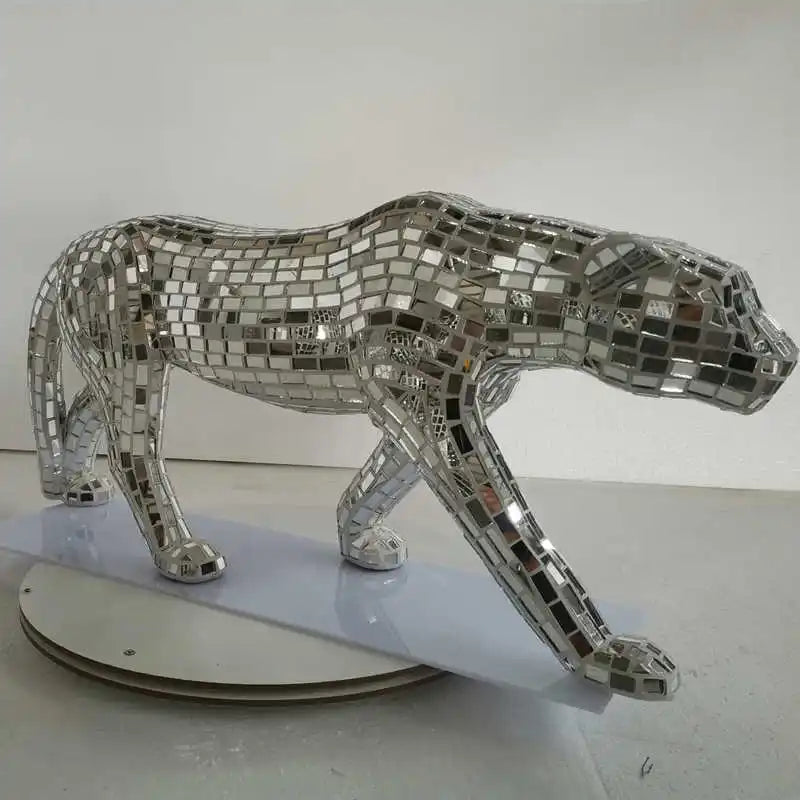 Luxury leopard figurine in stunning mirror mosaic finish, an extravagant statement piece for refined interiors.