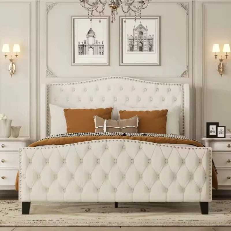 Contract-Grade Tufted Velvet Wingback Bed with silver nailhead trim in a luxury bedroom setting.