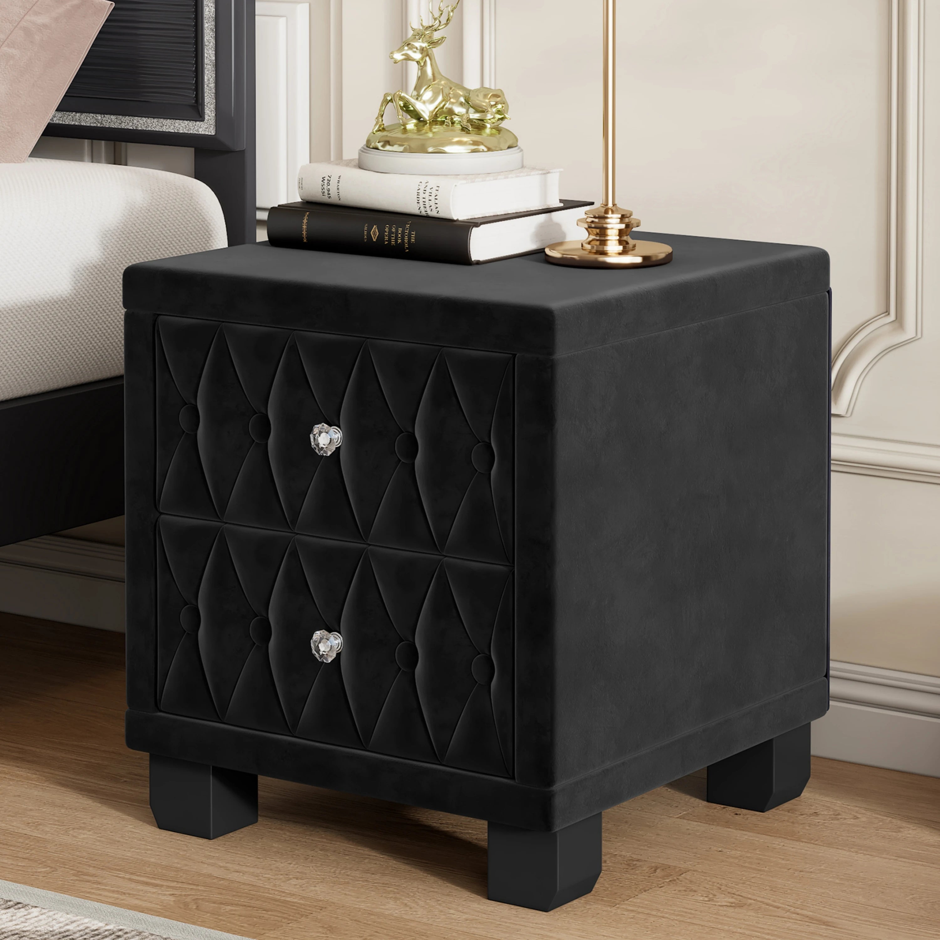 Black nightstand with diamond patterned drawer in a bedroom setting