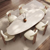 Dining table set with chairs on a wooden floor