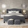 contract-grade tufted velvet wingback bed with gray upholstery and silver nailhead trim in a modern bedroom setting.