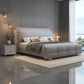 Italian luxury solid wood bed with genuine leather upholstery in a modern bedroom setting.