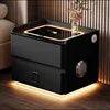Smart nightstand with wireless charging and LED lighting in sleek black design.