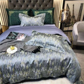 Luxury black and gold yarn-dyed jacquard Egyptian cotton bedding set on bed with decorative pillows