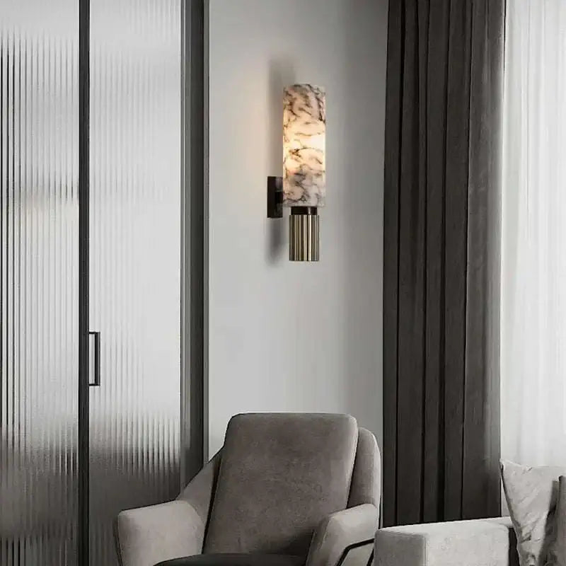 Modern marble wall lamp illuminating a stylish interior space with elegant decor.