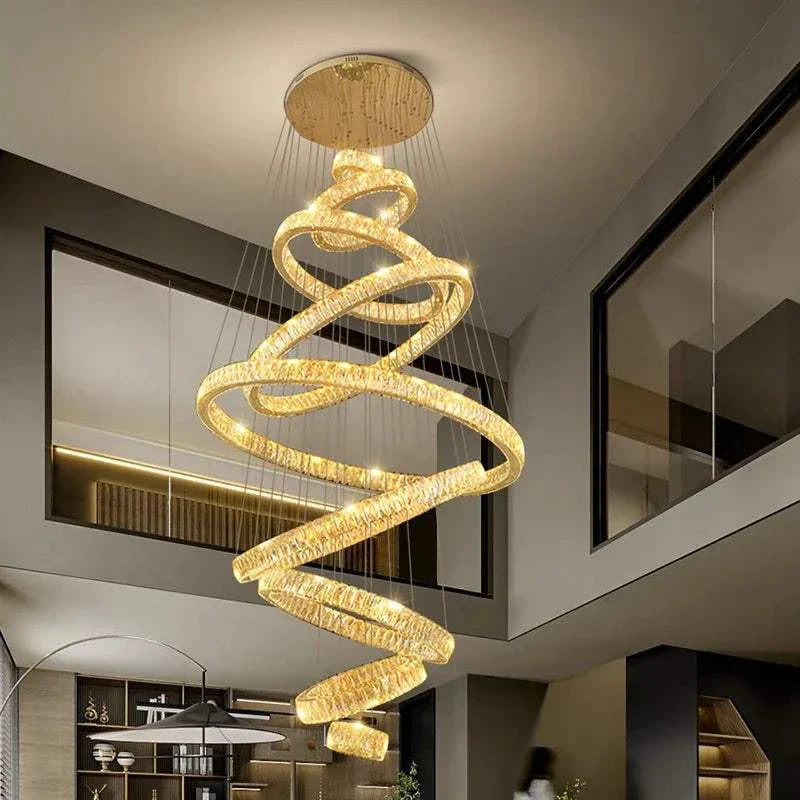 Elegant hall chandelier with spiral LED design hanging in modern staircase setting