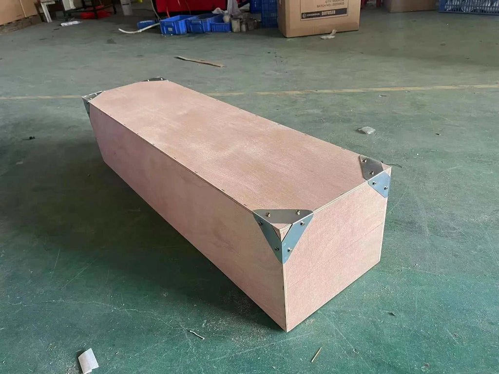 Wooden bench with metal brackets on a concrete floor