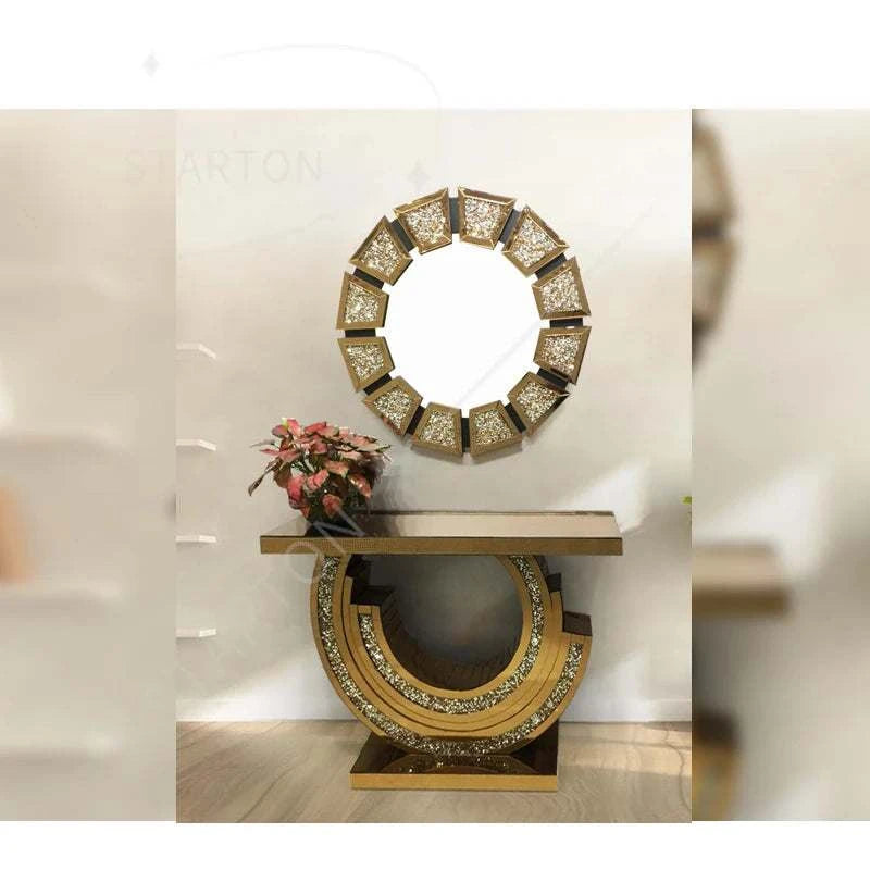 Decorative console table with mirror and flowers against a white wall