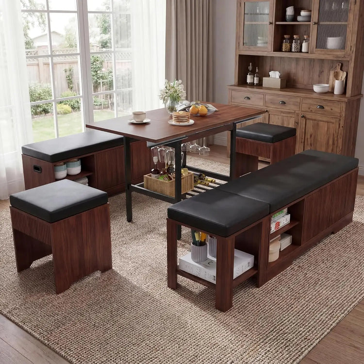 Dining room with wooden table and benches, large windows, and a rug.