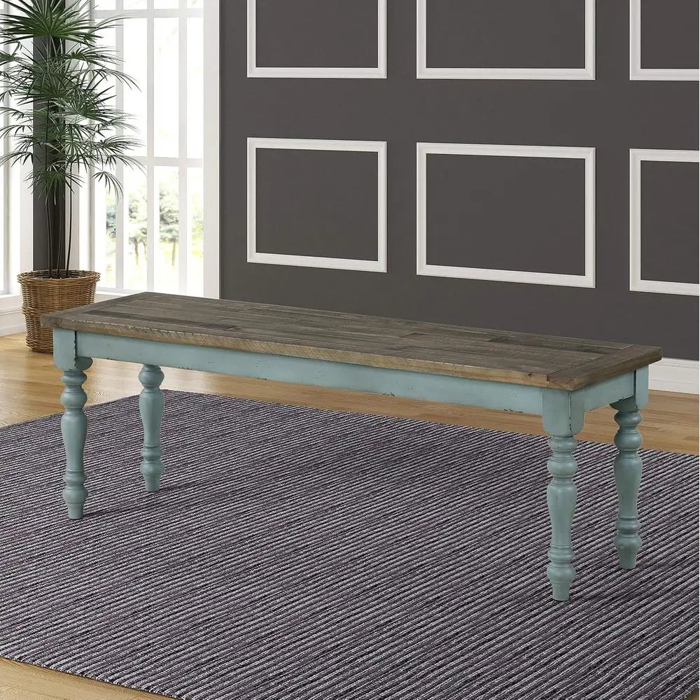 Farmhouse dining set antique blue bench with distressed walnut top, styled in a contemporary living space.
