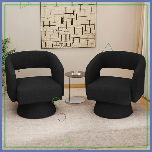 Two black chairs in a room with abstract wall art and a small table.