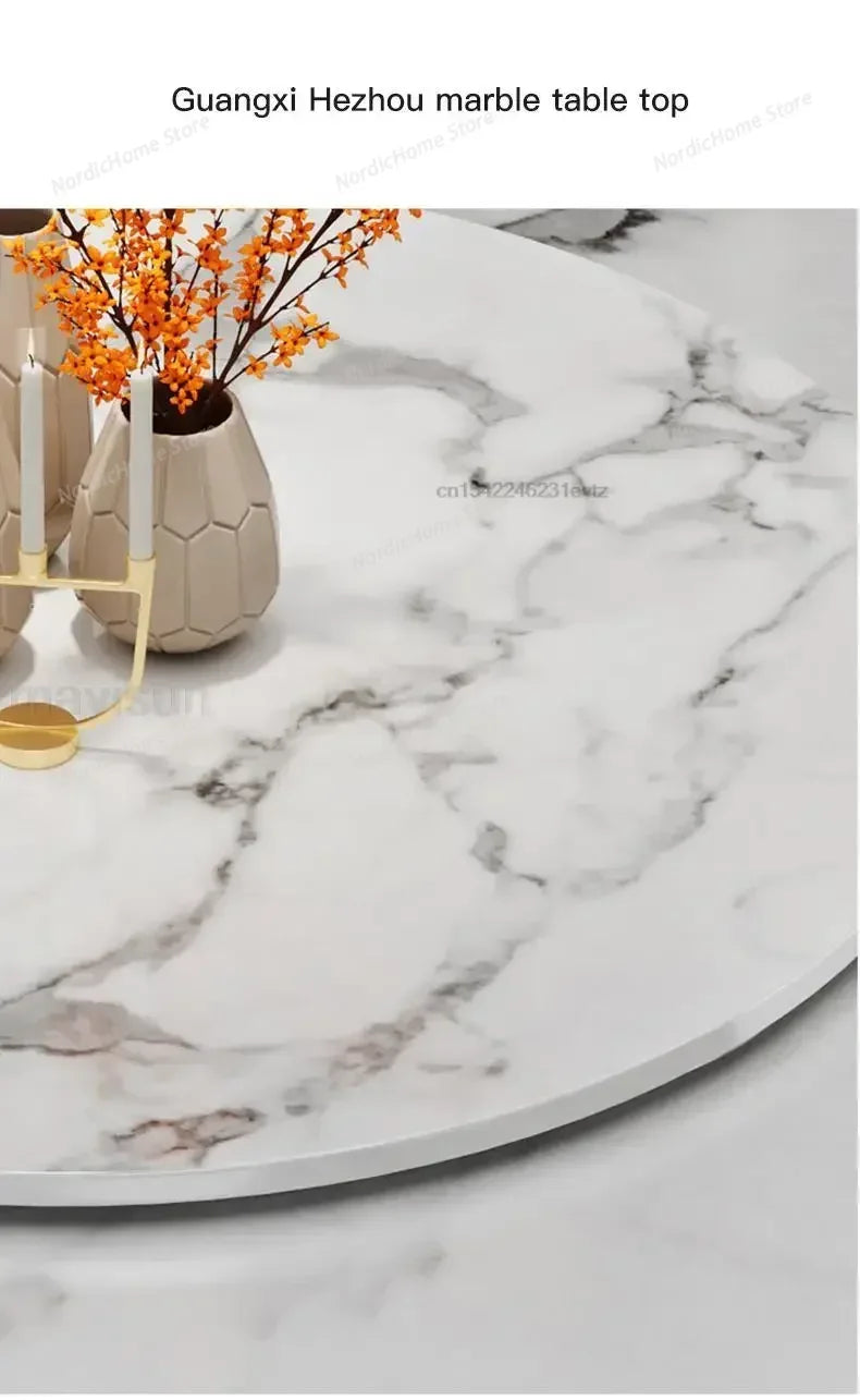 Close-up of a Guangxi Hezhou marble table top with decorative vase and candles, showcasing modern marble glass dining table design.