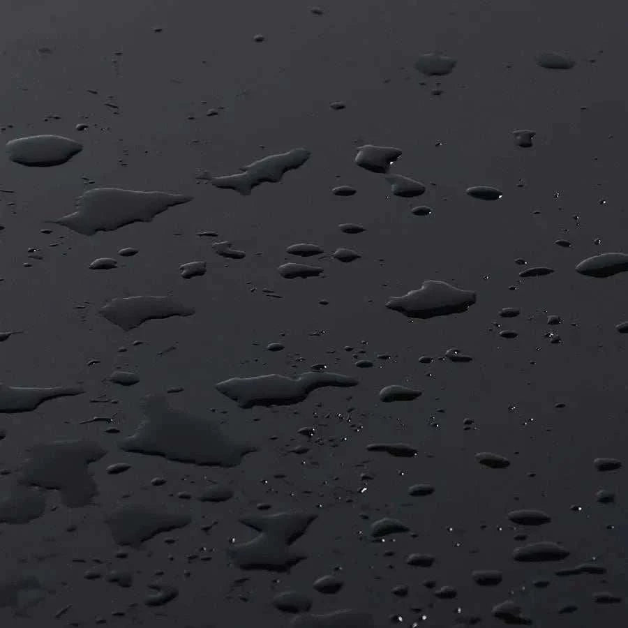 Pattern of water droplets on a dark surface