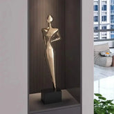 Italian minimalist figure sculpture displayed in a modern interior showcasing elegance and style.