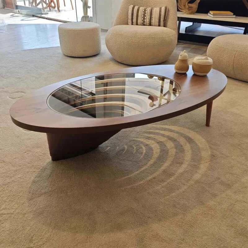 Modern coffee table with glass top in a living room setting