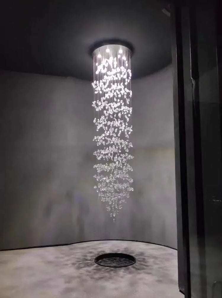 Chandelier hanging from a ceiling in a dimly lit room