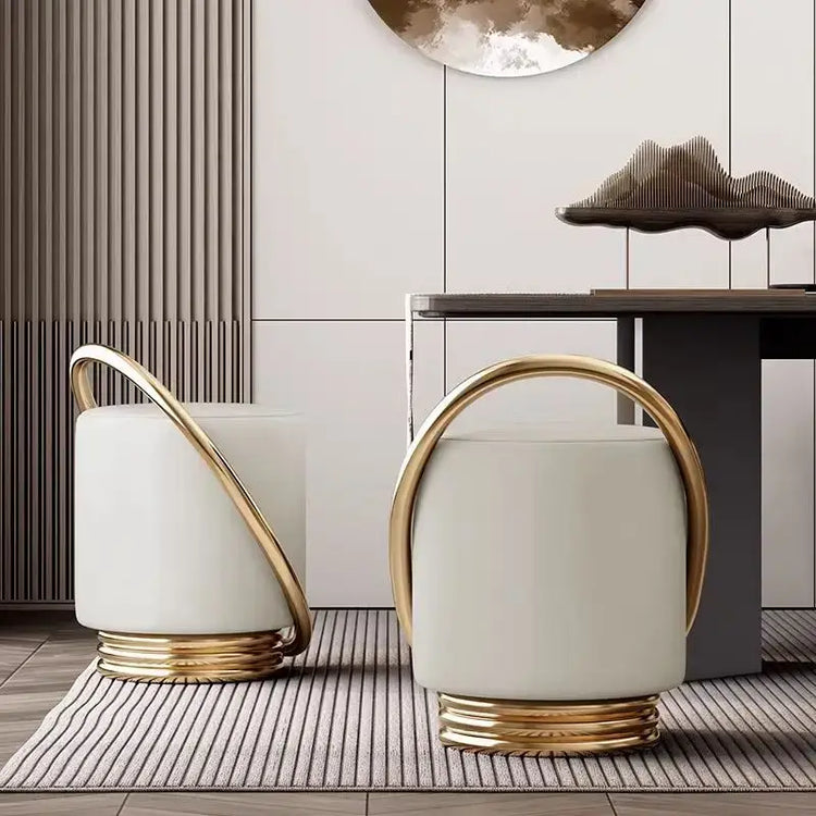 Nordic modern dressing table set featuring elegant stools with gold accents and a minimalist design in a stylish interior.