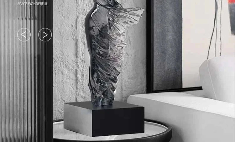 Decorative sculpture on a stand in an interior setting
