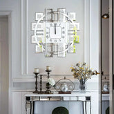 Irregular diamond mirrored wall clock displayed in an elegant interior setting with decorative elements.
