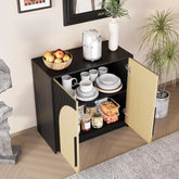 Coffee bar with a cabinet, coffee maker, and various items in a room setting.