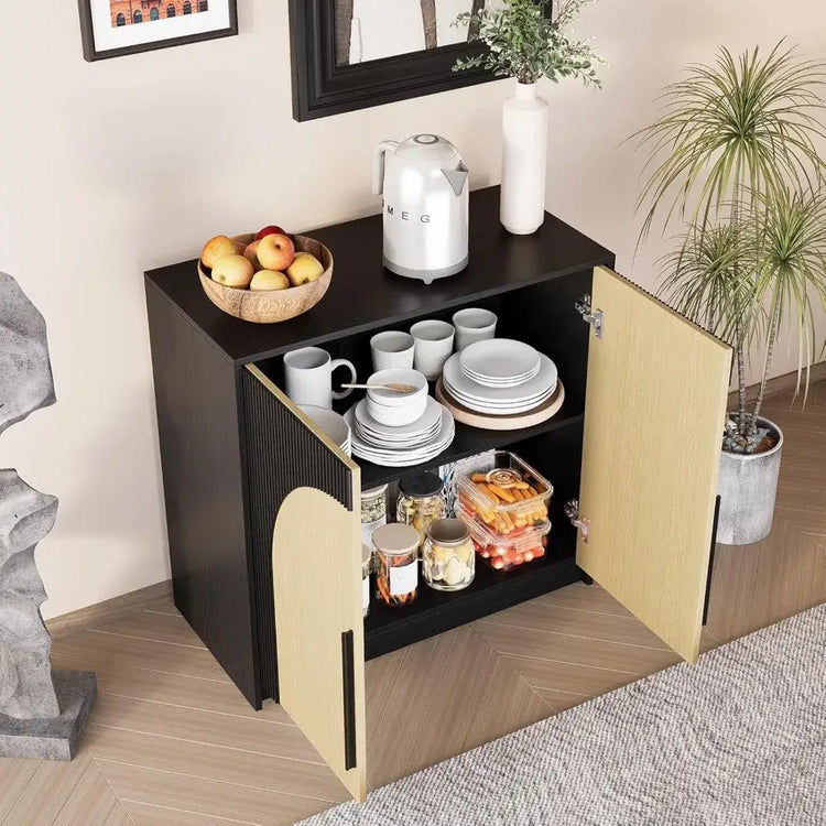 Coffee bar with a cabinet, coffee maker, and various items in a room setting.