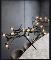 Modern chandelier with multiple lights on a gray wall background