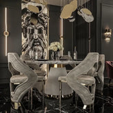 luxury marble dining table set featuring a polished top and elegant modern chairs in a stylish dining room.