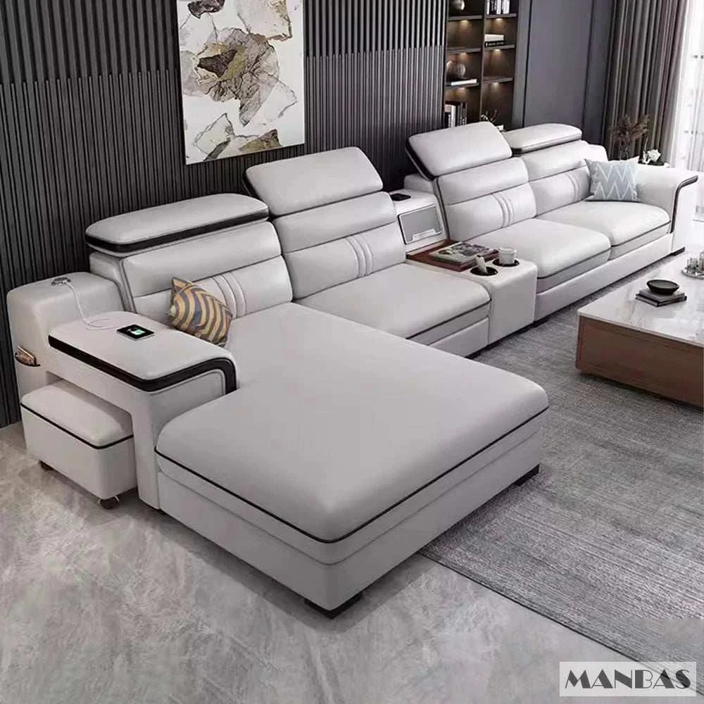 Modern white sectional sofa in a living room setting with decor elements.