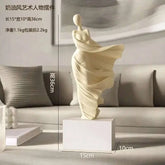 Decorative sculpture on a pedestal with dimensions displayed