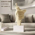 Decorative sculpture on a pedestal with dimensions displayed