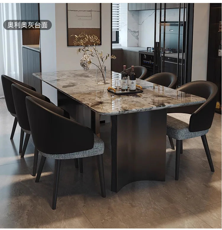 Italian Marble Dining Set featuring a stylish rectangular table and elegant chairs in a modern dining space.