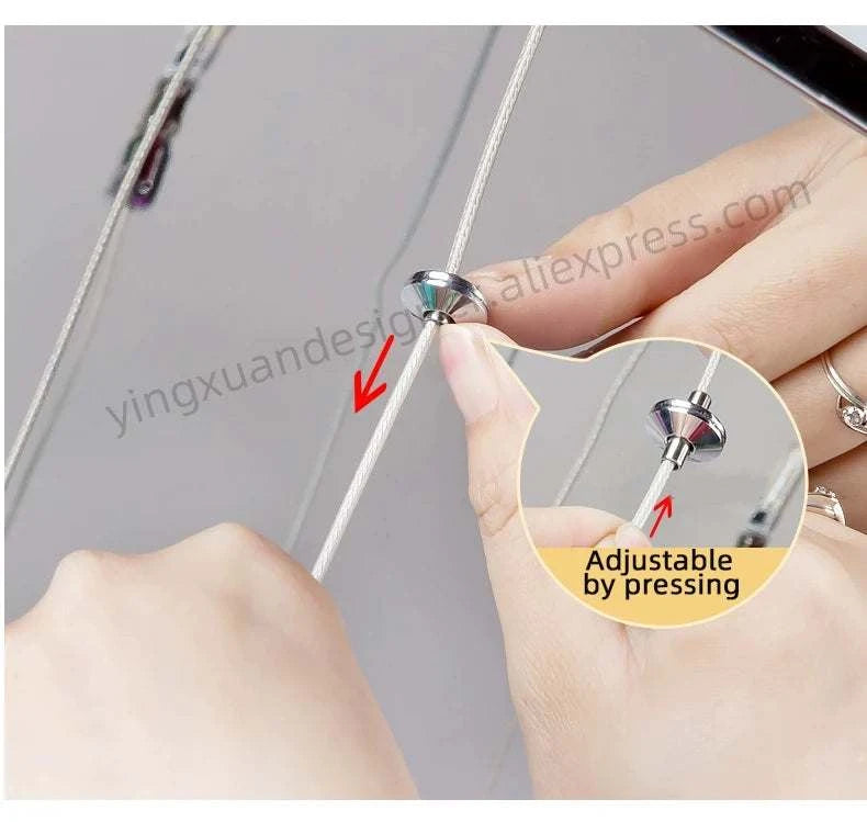 Close-up of a hand adjusting an earring with a focus on the adjustable feature.
