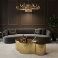 Modern gold stainless steel coffee table in stylish living room with elegant decor.