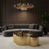 Modern gold stainless steel coffee table in stylish living room with elegant decor.