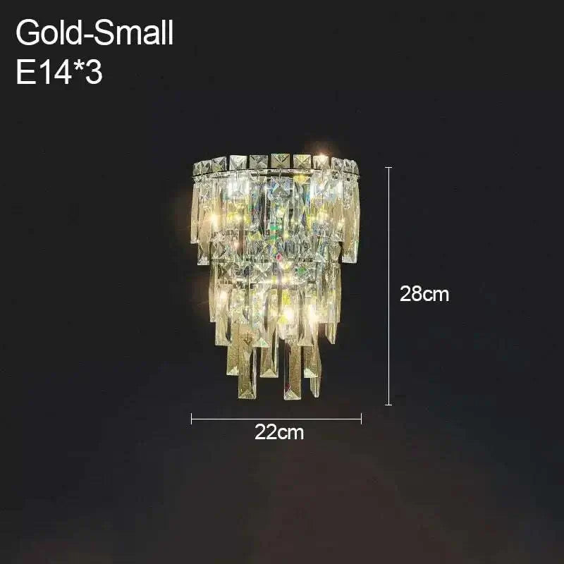 Gold small crystal wall lamp with cascading crystals and dimensions 28cm height by 22cm width