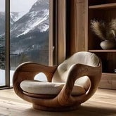 Italian minimalist recliner chair in a stylish living room with scenic mountain view.