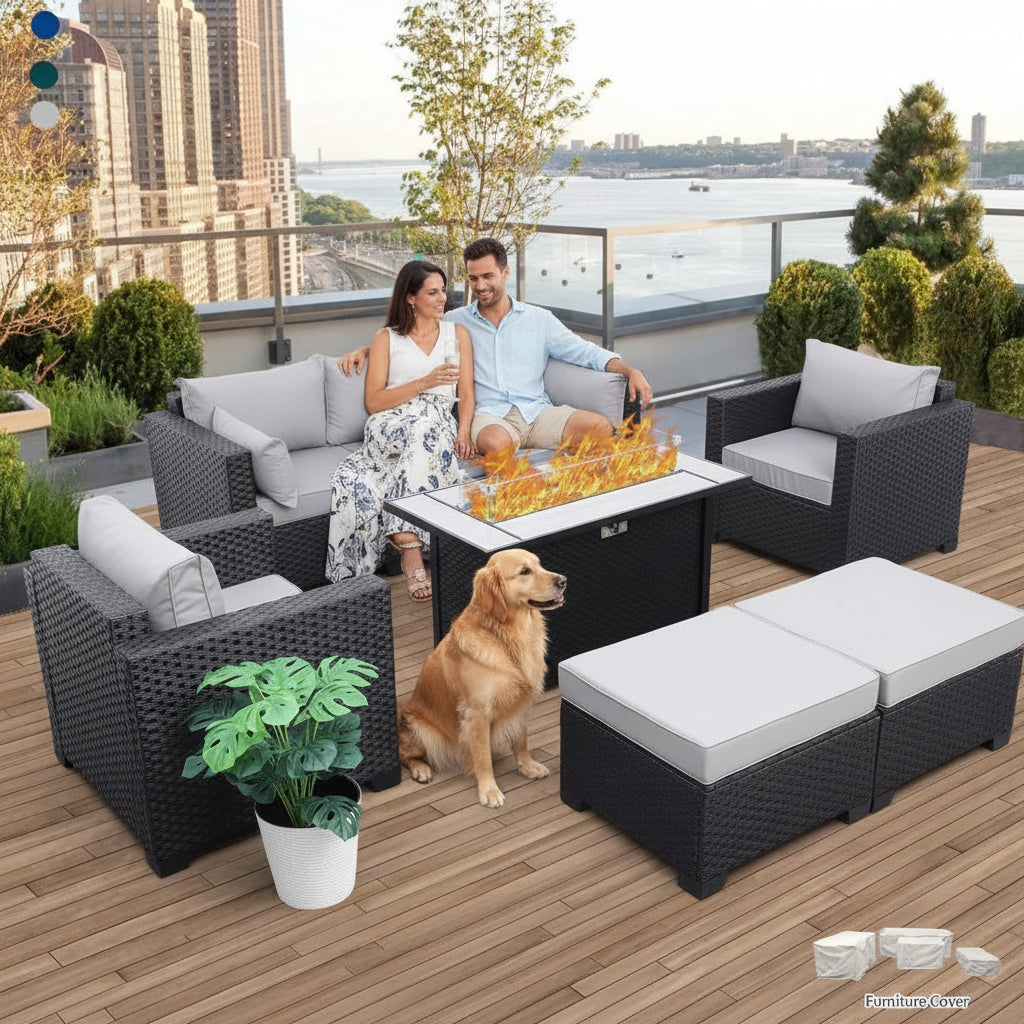 Outdoor patio furniture set with fire pit table on a wooden deck with cityscape background 2 people and a dog