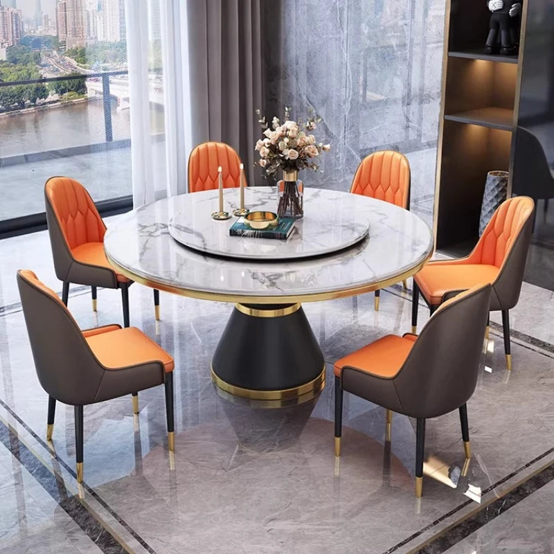 Modern Marble Dining Set featuring a round table and stylish chairs in a contemporary dining space.