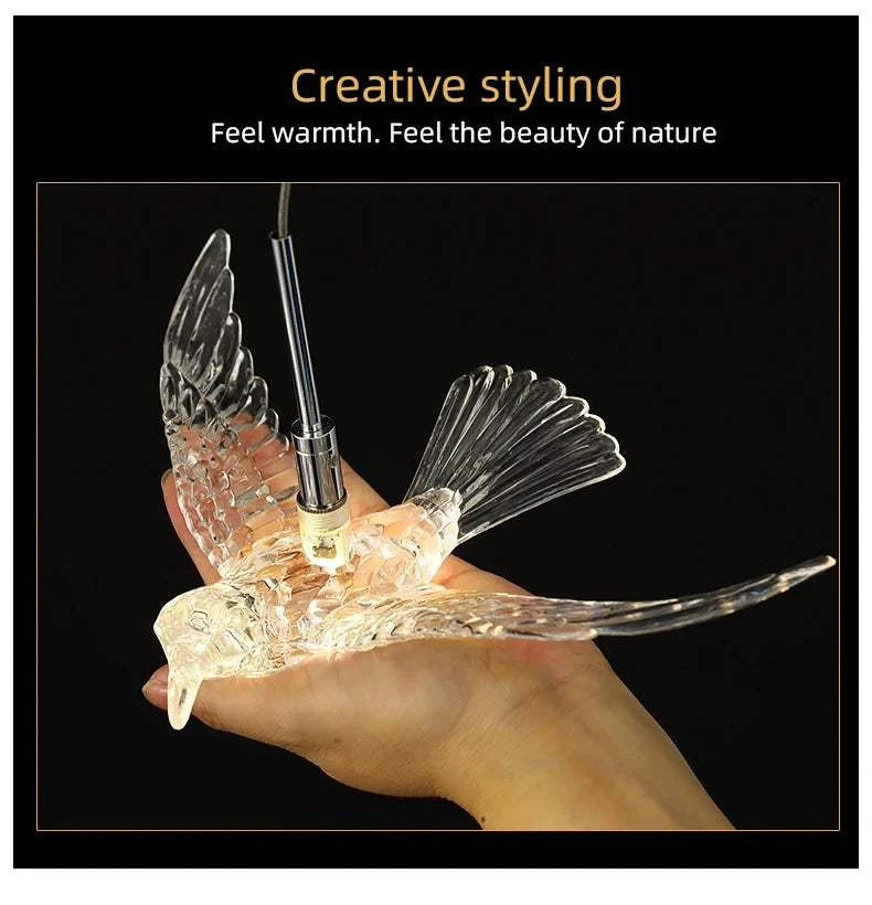 Glass bird-shaped lamp held in a hand with text 'Creative styling' and 'Feel warmth. Feel the beauty of nature'.