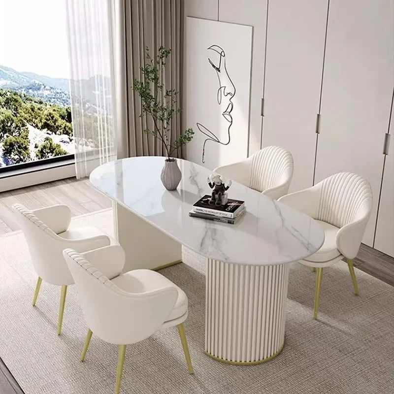 Modern dining room with marble table and white chairs