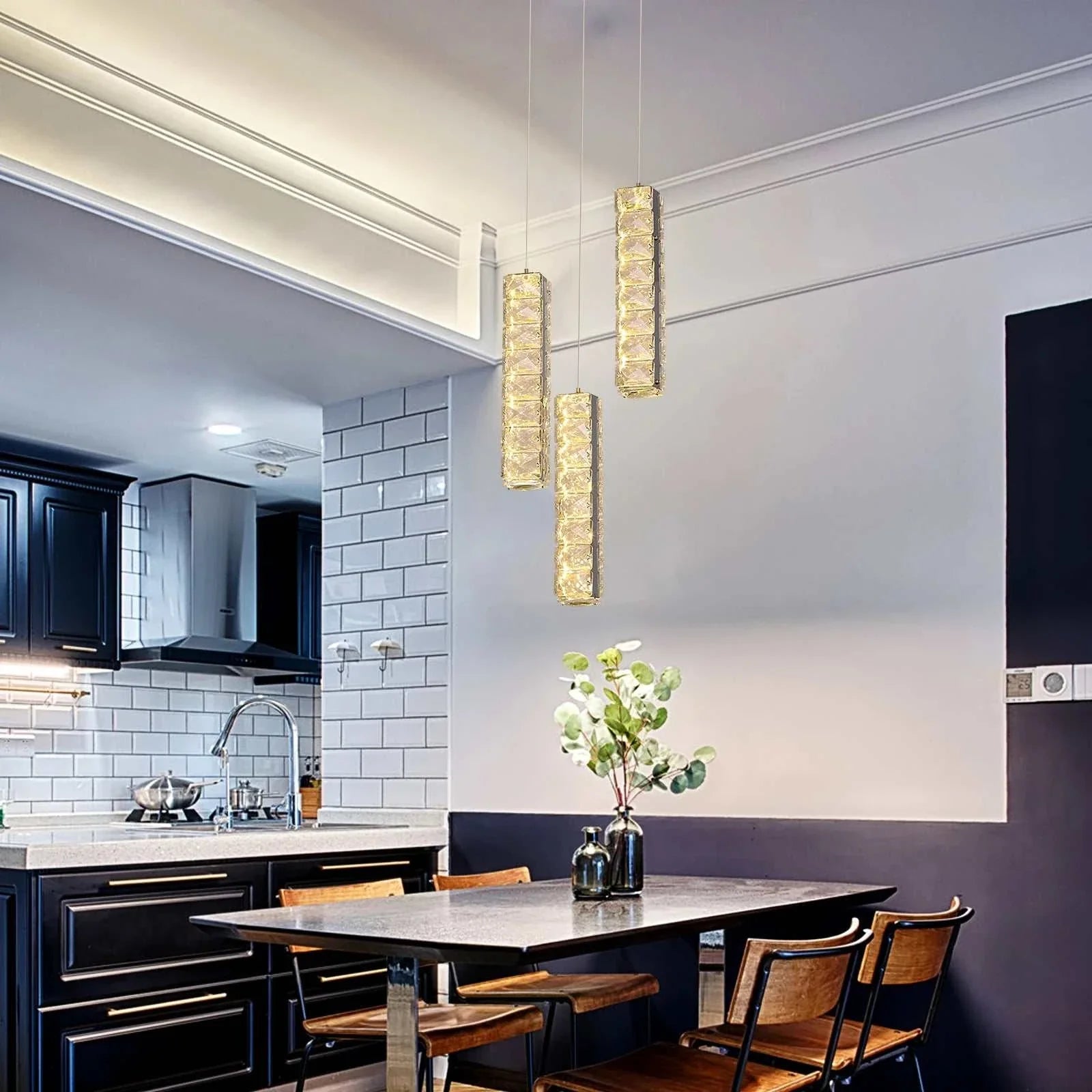 VETRULUS Nordic K9 Crystal Led Chandelier with metal craftsmanship and sparkling crystals hanging over dining table in modern kitchen