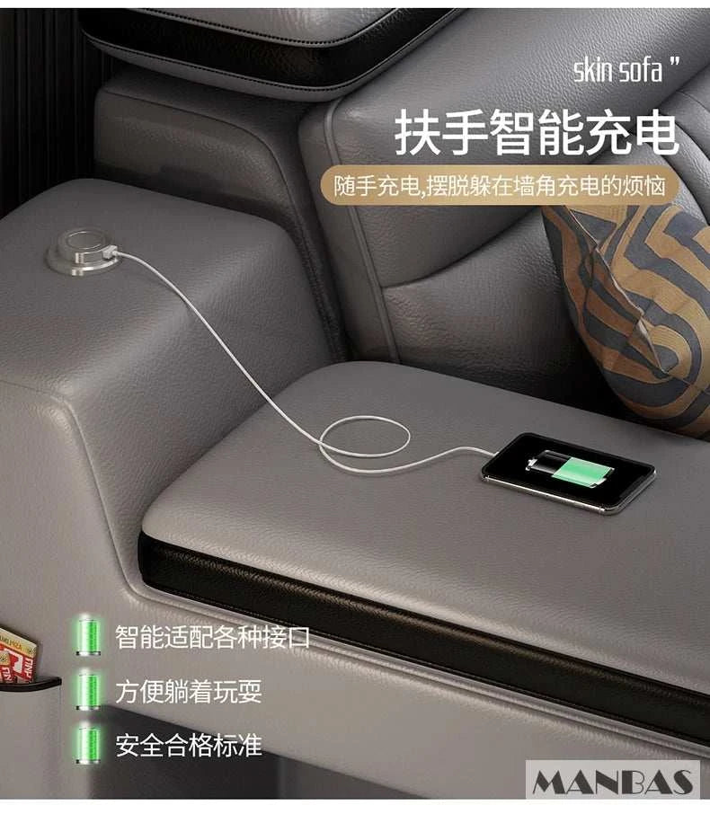 Car armrest with charging pad and smartphone, featuring MANBAS branding.