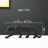 Black panther figurine with measurements on a dark background