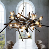 Modern chandelier with multiple lights in a room with large windows.