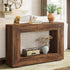 Wooden console table with decorative items in a living room setting