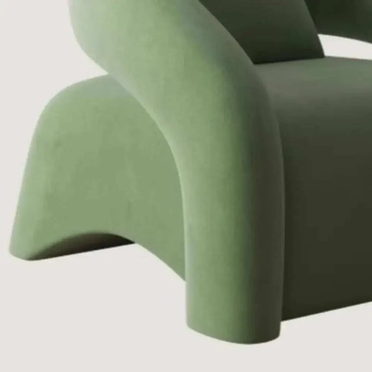 Green chair with a modern design on a light gray background