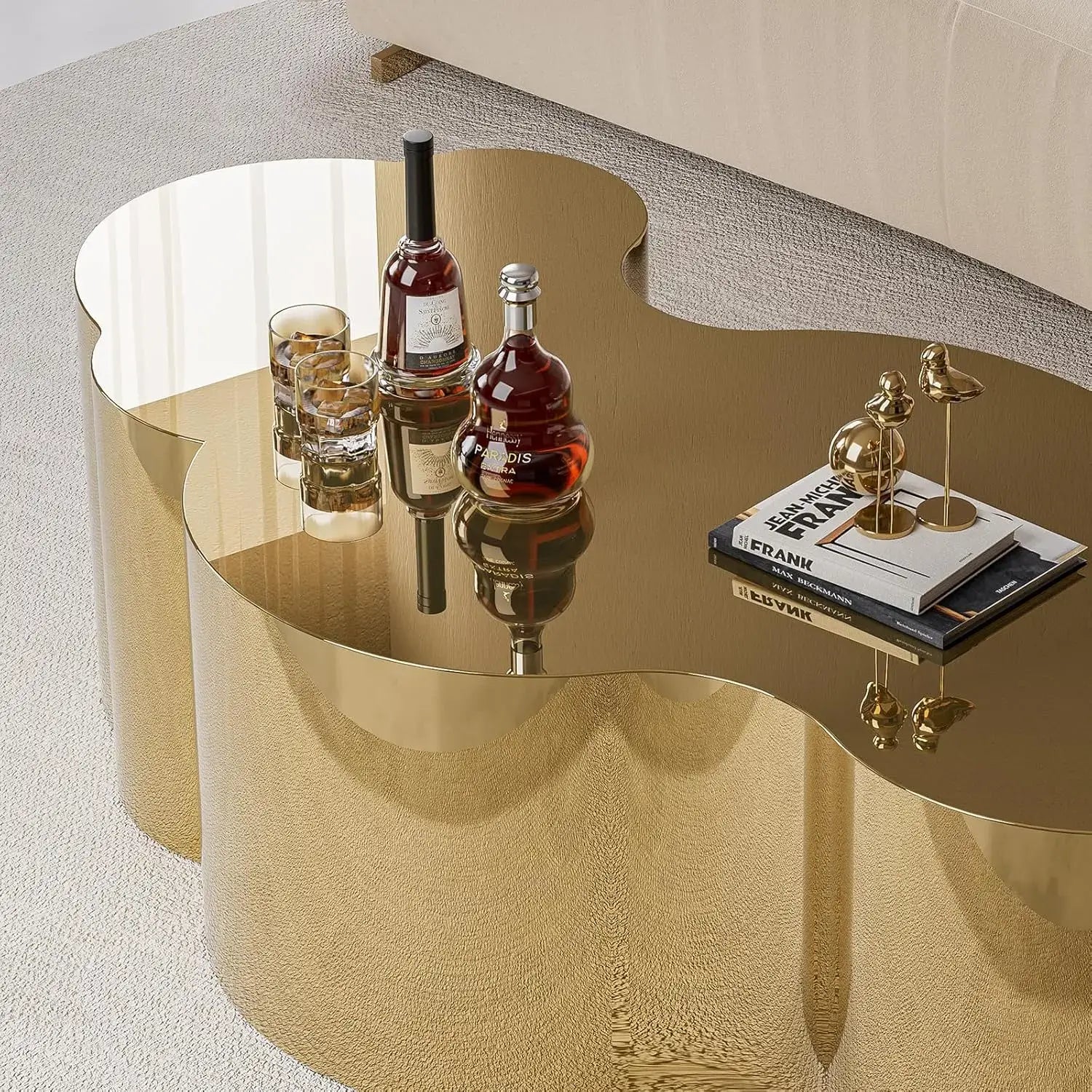 Modern Gold Stainless Coffee Table, Large Cloud Fashion Design Accent Table for Living Room Bedroom with decorative items.