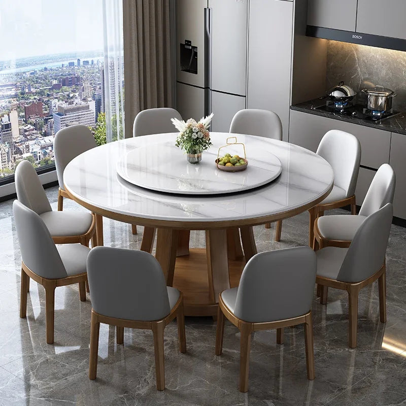 Dining table with chairs in a modern kitchen with cityscape view