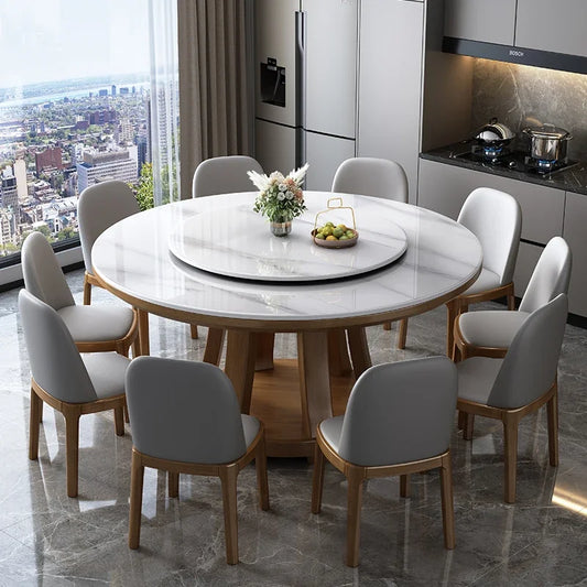 Dining table with chairs in a modern kitchen with cityscape view